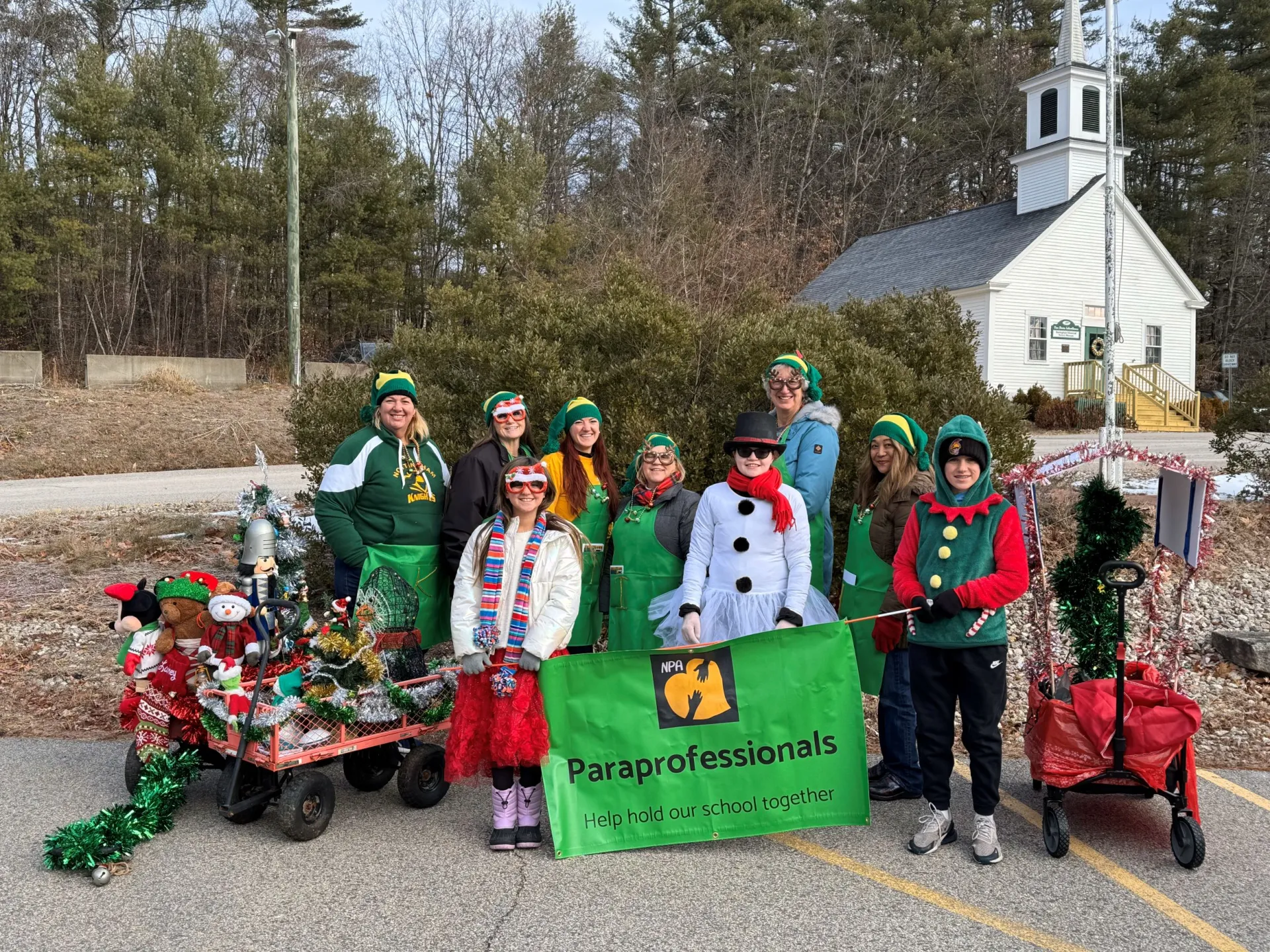 An image of the Nottingham Paraprofessionals participating in their local holiday parade.